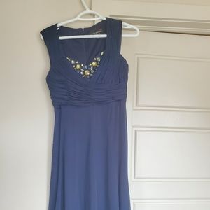 Short blue beaded dress.